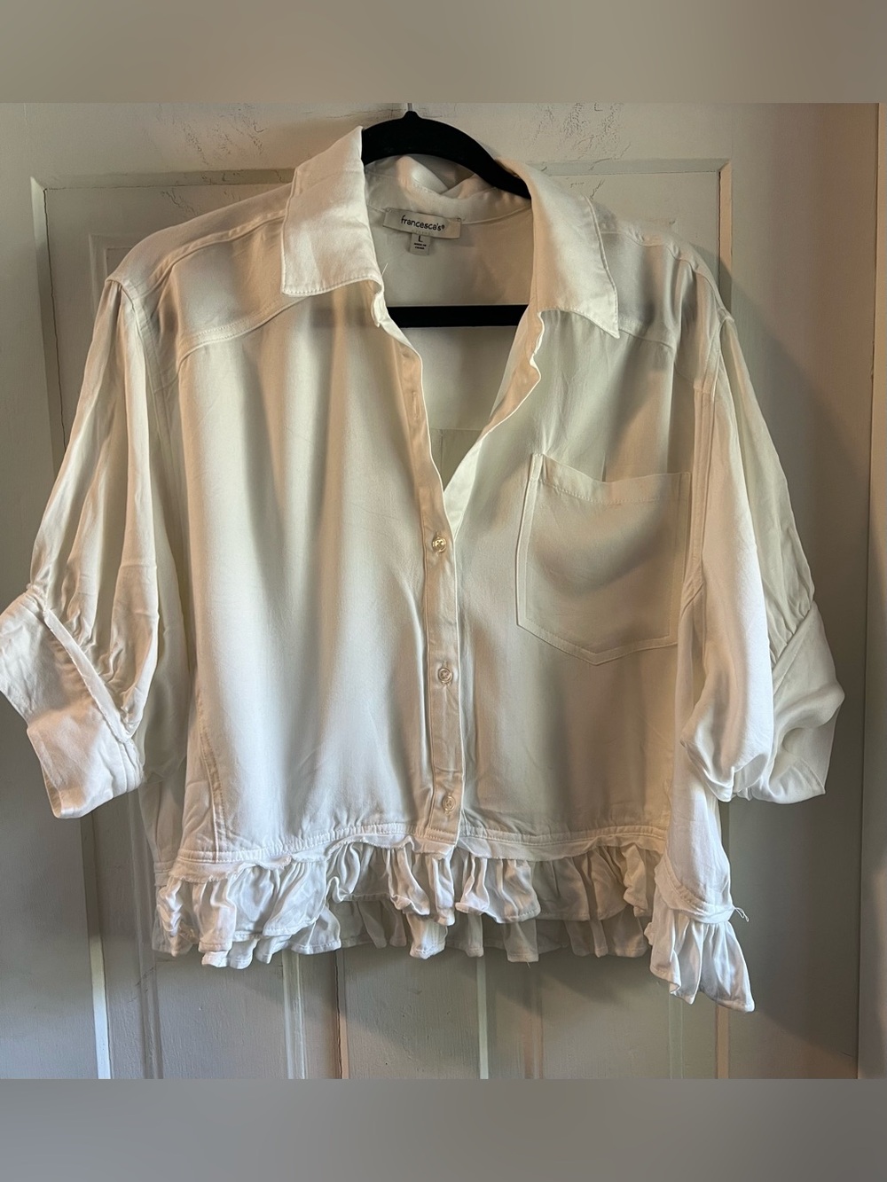 Francesca’s White Ruffle-Hem Button Front Blouse